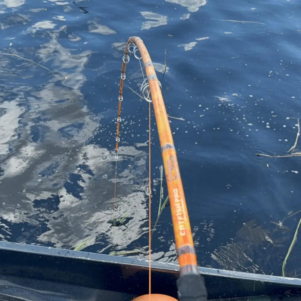 Orange Dragon Fire Spinning Glow Rod | Action: Medium Medium-Heavy Heavy - Catfish