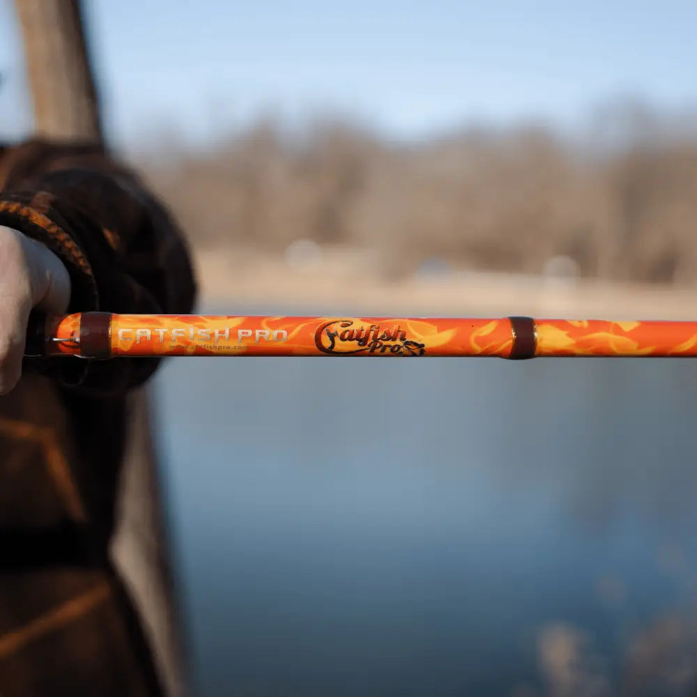 Orange Dragon Fire Spinning Glow Rod | Action: Medium Medium-Heavy Heavy - Catfish